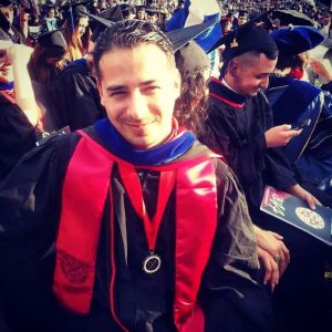 Me, graduating with my MA in English